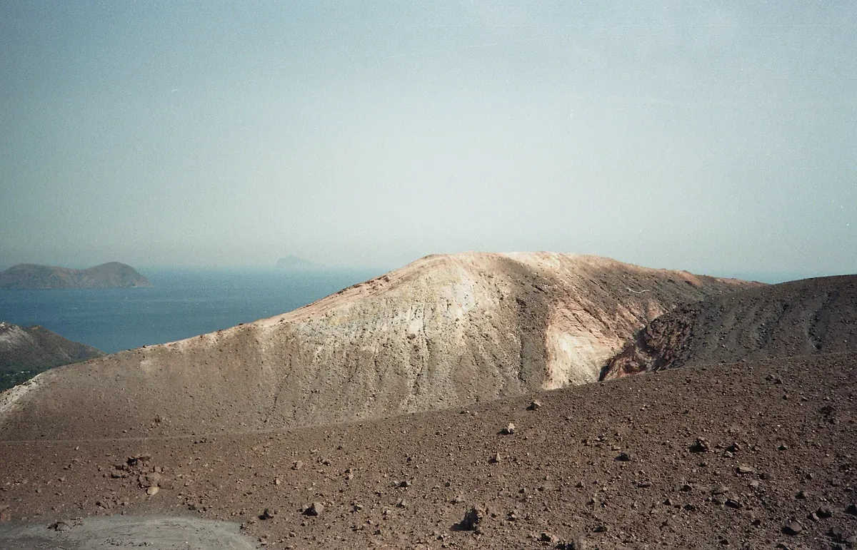 Black summit craters of Mount Etna under a clear sky on guided Mount Etna tours in Sicily