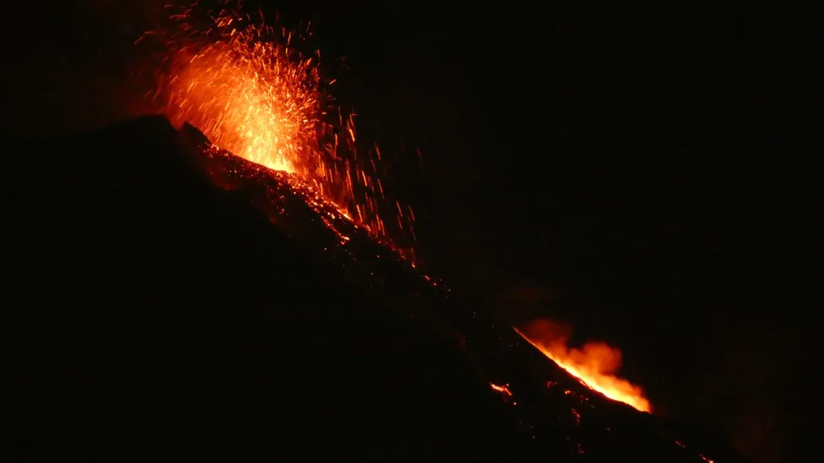Glow from the Southeast Crater of Mount Etna during an evening on a Mount Etna tour, Sicily